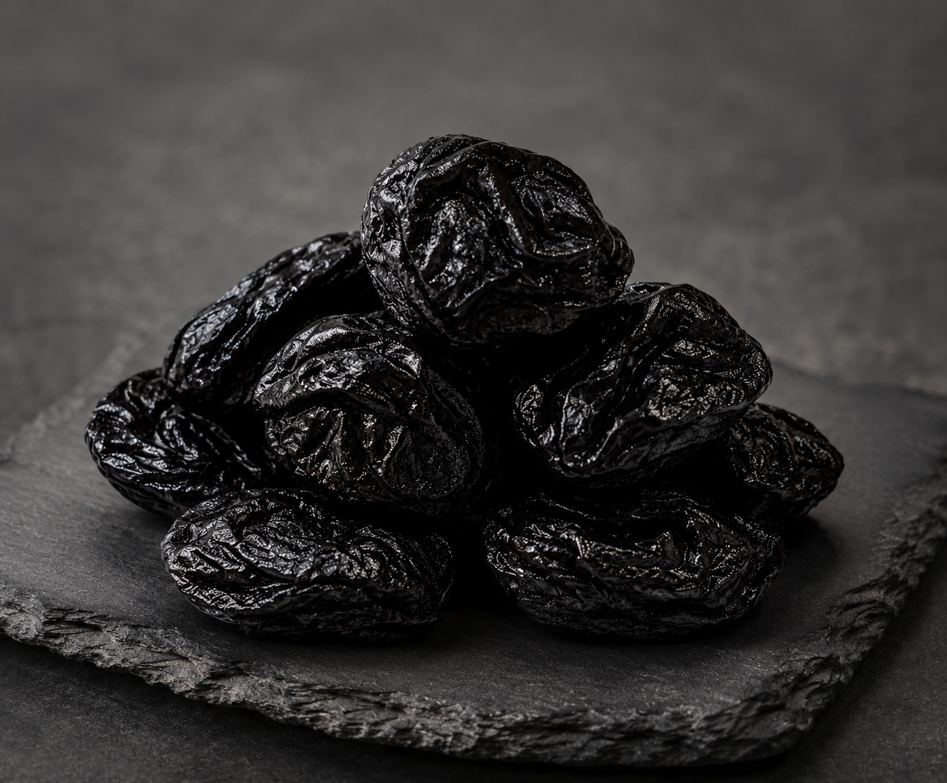 Anthracite smokeless fuel black coal lumps on slate